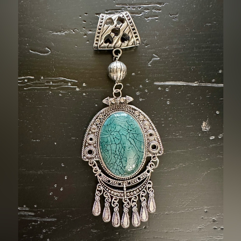 TURQUOISE SCARF ACCENT. SILVER TONE WITH OVAL, TURQUOISE STONE. 2 3/4”W X 7”L